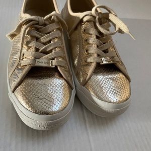 Bebe gold sneakers